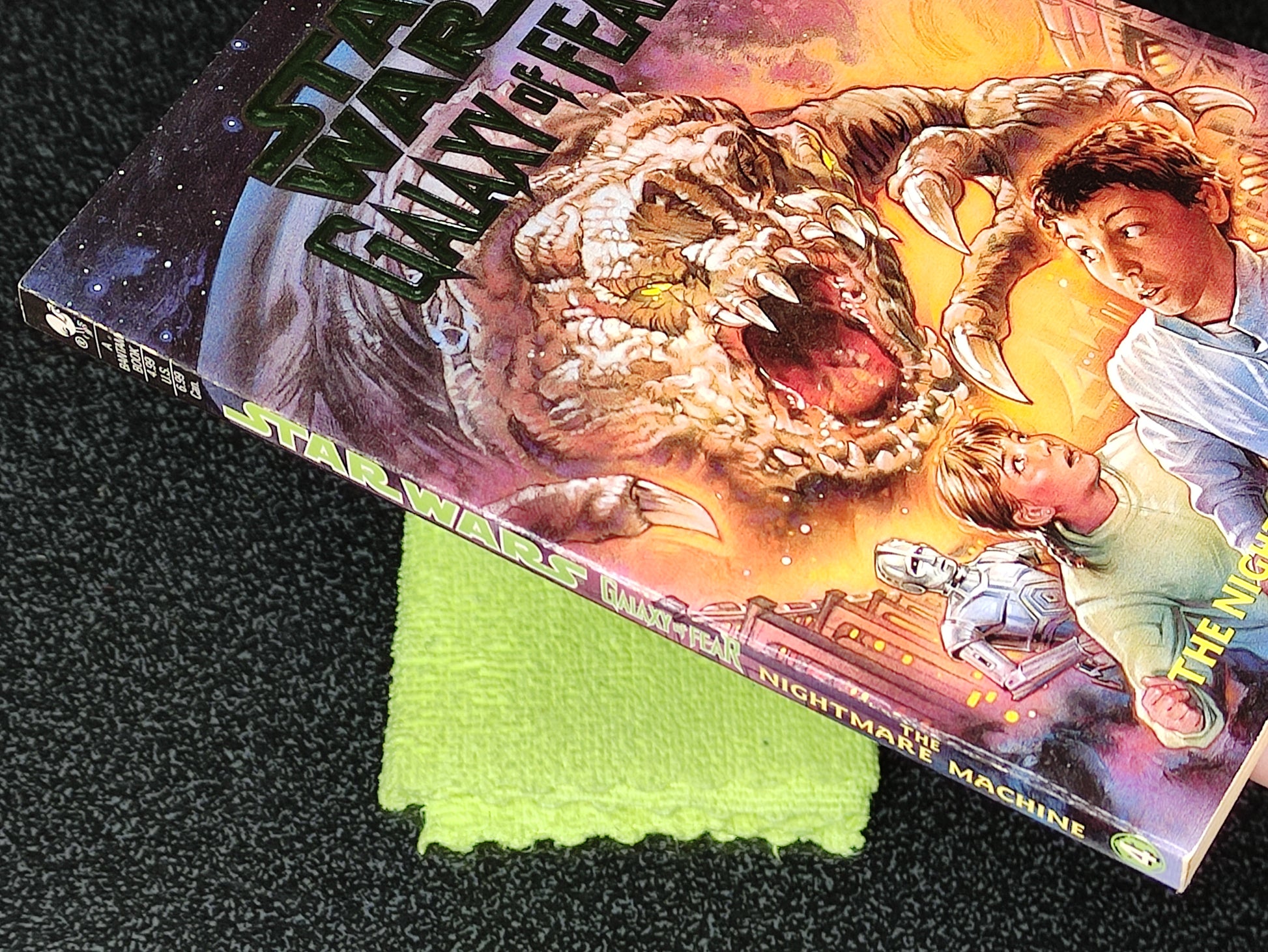 Comic book with a dragon and characters on a textured surface