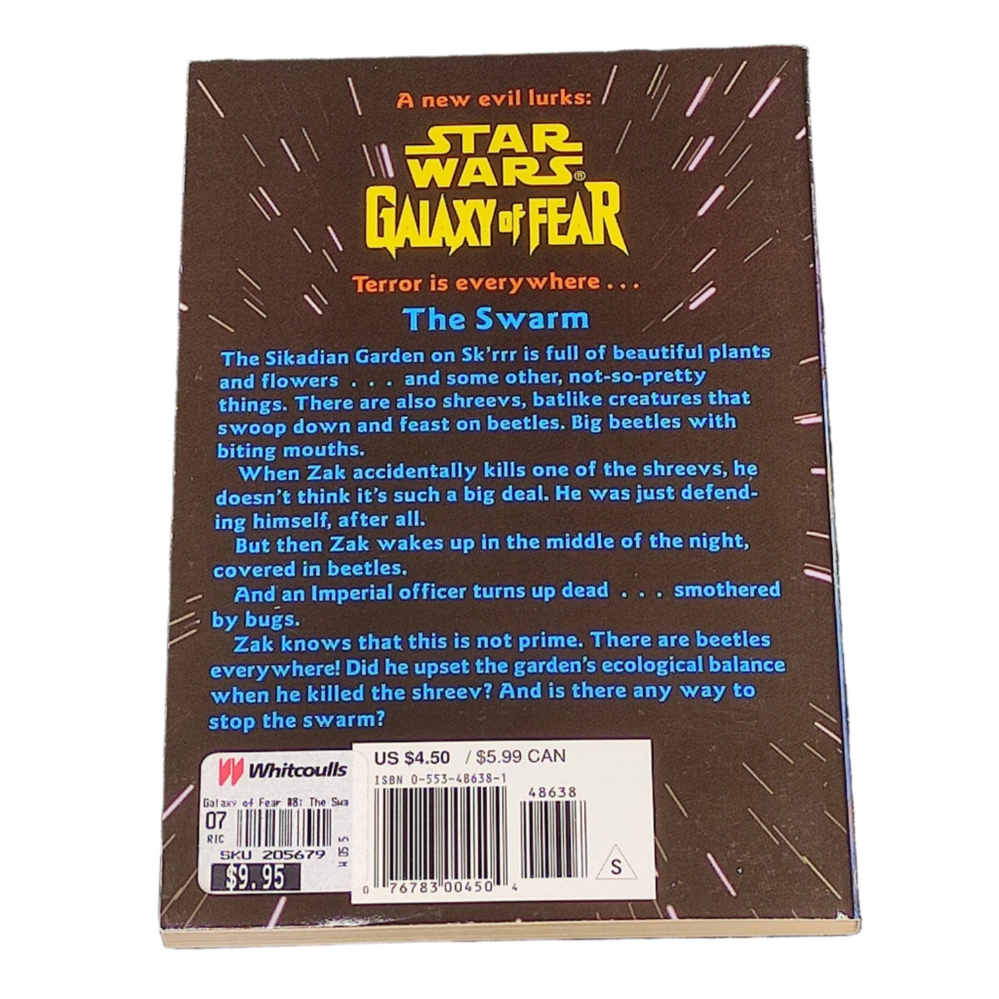 Back cover of a 'Star Wars' book titled 'Galaxy of Fear: The Swarm' on a textured surface.