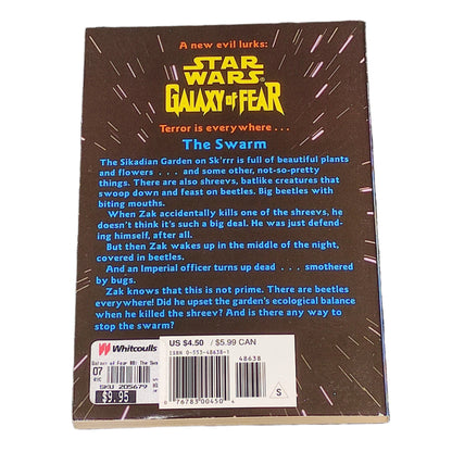 Back cover of a 'Star Wars' book titled 'Galaxy of Fear: The Swarm' on a textured surface.