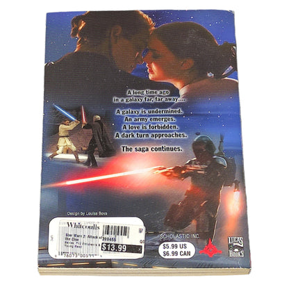 Book titled 'Star Wars Episode II: Attack of the Clones' on a textured black surface