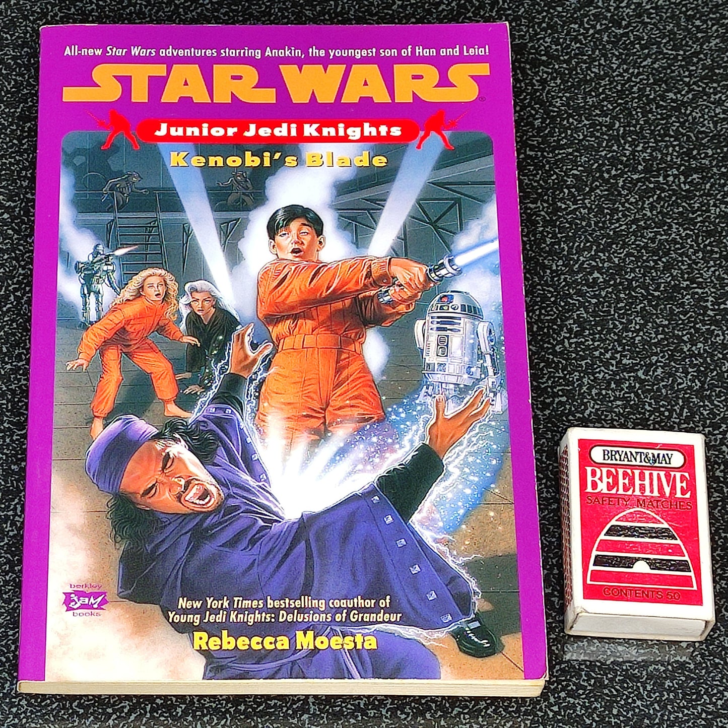 Star Wars Junior Jedi Knights book titled 'Kenobi's Blade' on a black textured background
