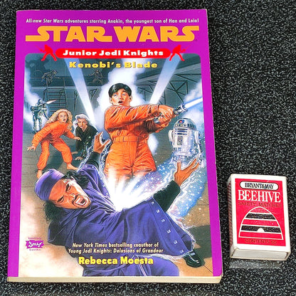Star Wars Junior Jedi Knights book titled 'Kenobi's Blade' on a black textured background