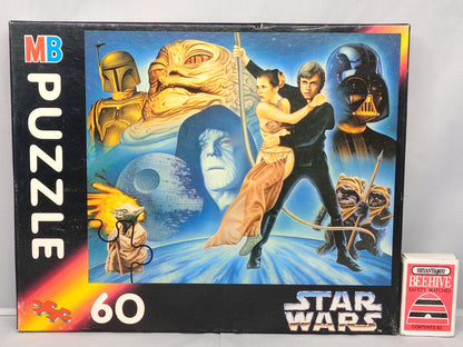 Star Wars puzzle box with characters and 'MB Puzzle' branding on a light gray background