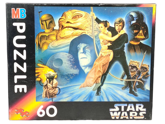 Star Wars puzzle box with characters and 'MB Puzzle' branding on a white background