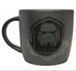 Black mug with 'Trooper' design on a white background